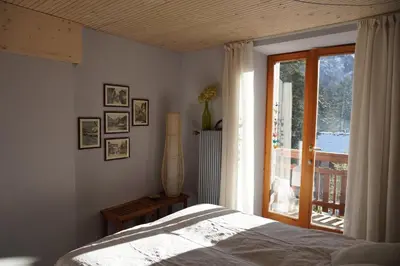 Ein Bett oder Betten in einem Zimmer der Unterkunft Renovierte Wohnung mit Ausblick für 1-2 Personen