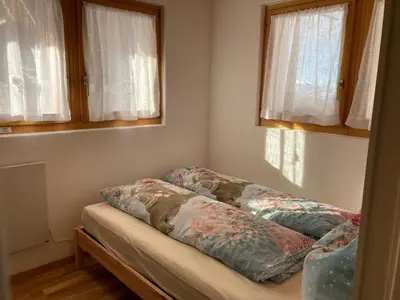Ein Bett oder Betten in einem Zimmer der Unterkunft Chalet Sonne