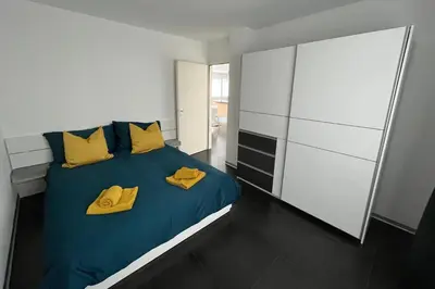 Ein Bett oder Betten in einem Zimmer der Unterkunft Appartement Tourbillon centre-ville