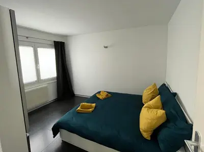 Ein Bett oder Betten in einem Zimmer der Unterkunft Appartement Tourbillon centre-ville
