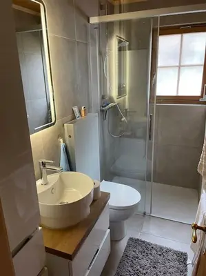 Ein Badezimmer in der Unterkunft Chalet Kuckuk