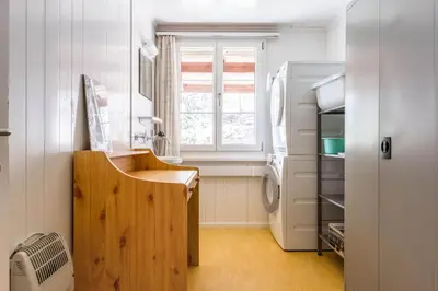 Ein Bett oder Betten in einem Zimmer der Unterkunft Chalet Lienzhubel - GRIWA RENT AG