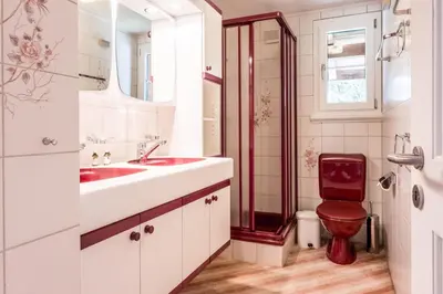 Ein Badezimmer in der Unterkunft Chalet Lienzhubel - GRIWA RENT AG