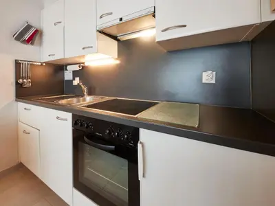 Küche/Küchenzeile in der Unterkunft Apartment Dixence 310 by Interhome