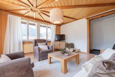 Ein Sitzbereich in der Unterkunft The Eiger Express Apartment - GRINDELHOMES