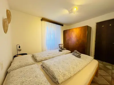 Ein Bett oder Betten in einem Zimmer der Unterkunft Casa Leoni a Moghegno