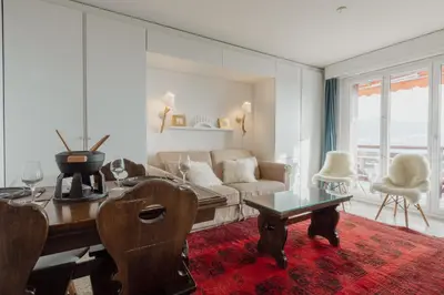 Ein Sitzbereich in der Unterkunft Logement avec vue spectaculaire sur les montagnes