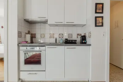 Küche/Küchenzeile in der Unterkunft Logement avec vue spectaculaire sur les montagnes