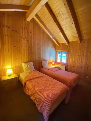 Ein Bett oder Betten in einem Zimmer der Unterkunft Auberge du Val des dix