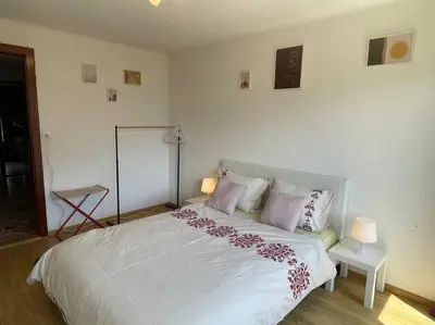 Ein Bett oder Betten in einem Zimmer der Unterkunft Besso Miège Spacieux, situation idéale pour visiter le Valais