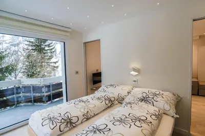 Ein Bett oder Betten in einem Zimmer der Unterkunft Haus Cristal - 1441m