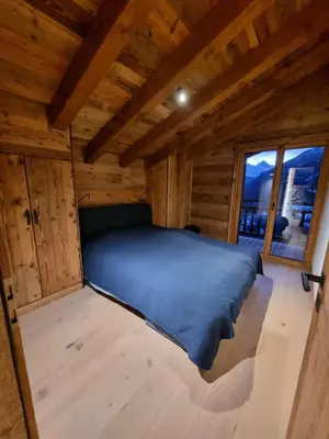 Ein Bett oder Betten in einem Zimmer der Unterkunft Chalet Mouflon