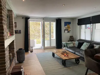 Ein Sitzbereich in der Unterkunft Le Manoir 2