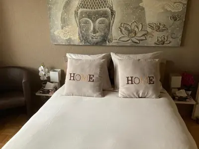 Ein Bett oder Betten in einem Zimmer der Unterkunft Les balcons du Rhône