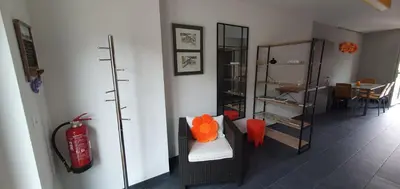 Ein Sitzbereich in der Unterkunft L'Aurosée