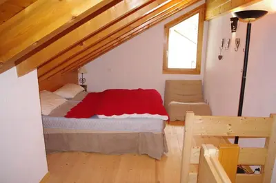 Ein Bett oder Betten in einem Zimmer der Unterkunft Forum L au centre de Zinal