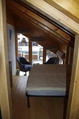Ein Bett oder Betten in einem Zimmer der Unterkunft Forum L au centre de Zinal